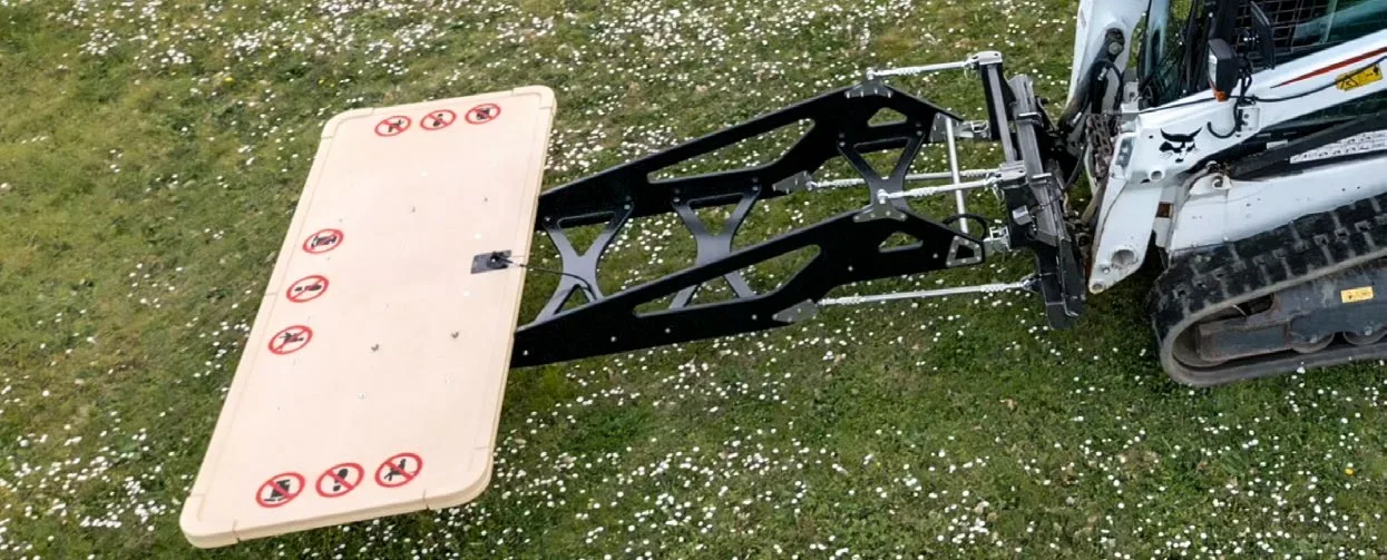 A CEIA EMVS-TL detector array mounted on a compact track loader